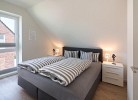 Ferienhaus Meeperle - Deine Ferien - Schlafzimmer 2 - Boxspringbett