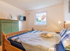 Schützenweg 3 Wohnung 2 - Deine Ferien - Schlafzimmer mit TV
