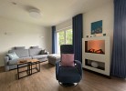 Wohnzimmer mit Elektro Kamin