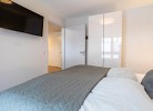 Ankerplatz - Deine Ferien - Schlafzimmer mit Smart-TV