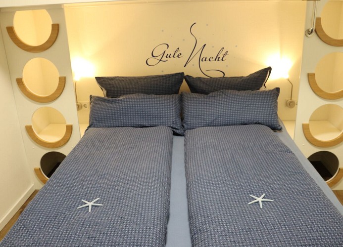 Ankerplatz Sielhuus - Deine Ferien - Schlafzimmer 2 mit Doppelbett und Hochbett