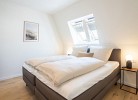 Villa Dornkamp - Wohnung 6 - Deine Ferien - Boxspringbett 