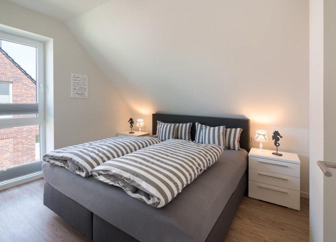 Ferienhaus Meeperle - Deine Ferien - Schlafzimmer 2 - Boxspringbett