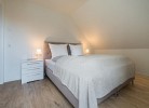 Ferienhaus Meeperle - Deine Ferien - Schlafzimmer 3 - Boxspringbett