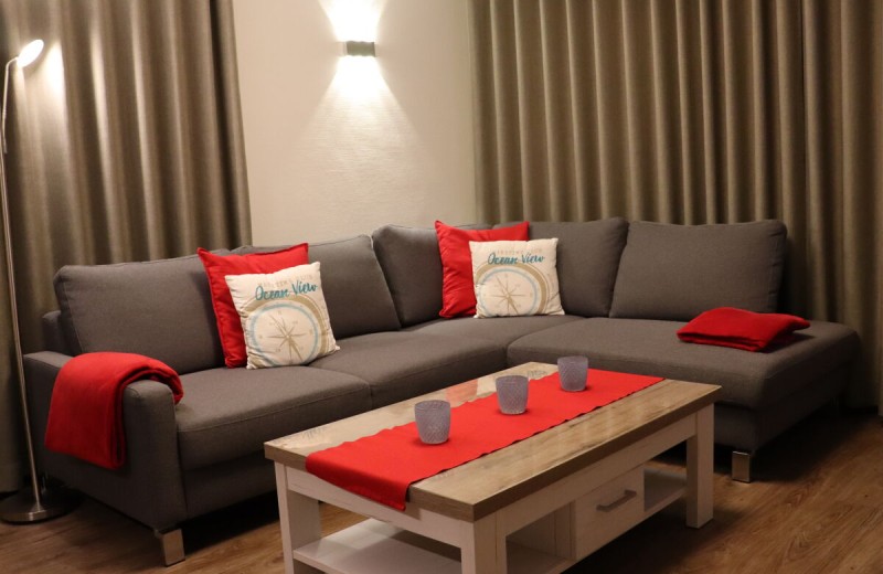 Ankerplatz Sielhuus - Deine Ferien - Wohnbereich mit Fernseher und Gaskamin