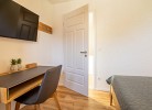 Villa BalticBliss auf Rügen - Deine Ferien - TV und Schreibtisch Schlafzimmer